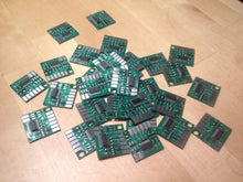 Buchka Engineering Wasted Spark Conversion Boards - many boards laid out on a table.